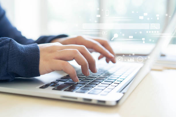 close up woman hand type on keyboard laptop to use search engine optimization (SEO) tools for finding customer or promote and advertise about content online for marketing technology and business concept