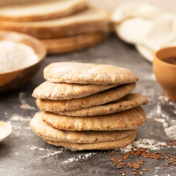 Pitta breads close up. Freshly baked wholegrain flat breads