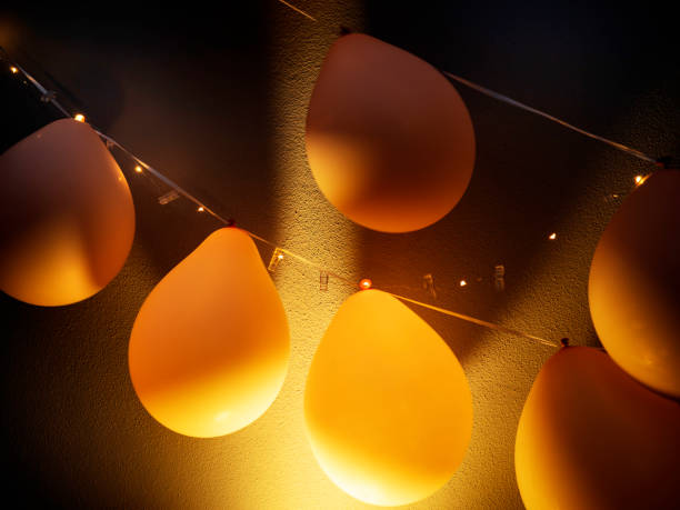 Yellow Hot air balloon over the green forest trees. Travel concept