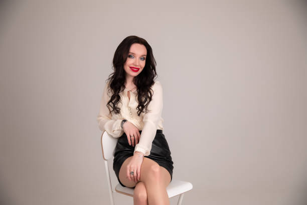 istock young woman sits on a chair. project manager. school teacher or student. 1270984607