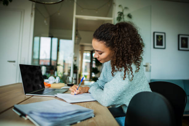 istock Beautiful woman works from home 1270989127