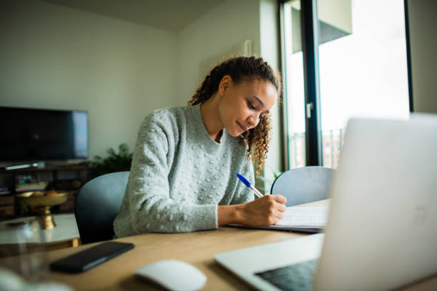 istock Beautiful woman works from home 1270989166