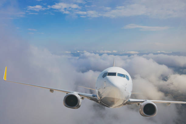 istock Passenger jet airplane flying above clouds. 1270990286