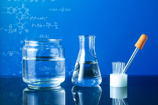 Science Lab Clear Group Of Laboratory Flasks Empty Or Filled With A Clear Liquid On Blue ...
