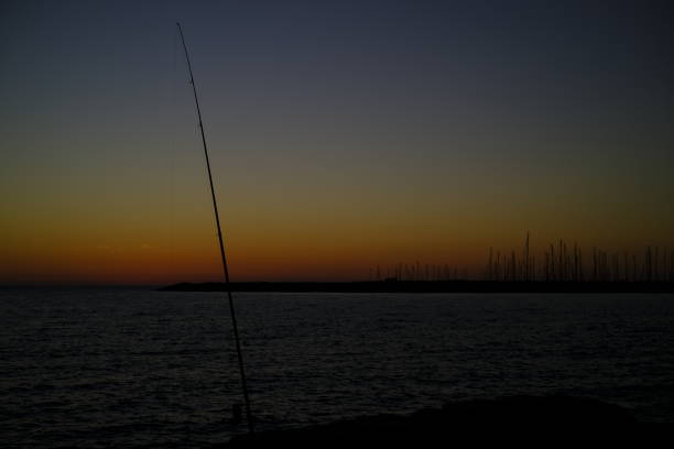 istock Sunset on the beach - Fischerman 1270990923
