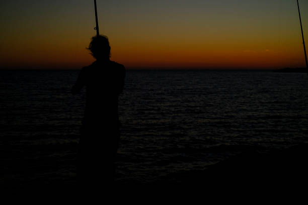 istock Sunset on the beach - Fischerman 1270991069