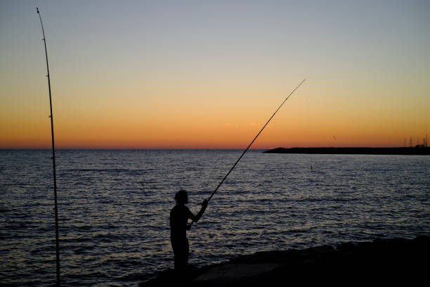istock Sunset on the beach - Fischerman 1270991117