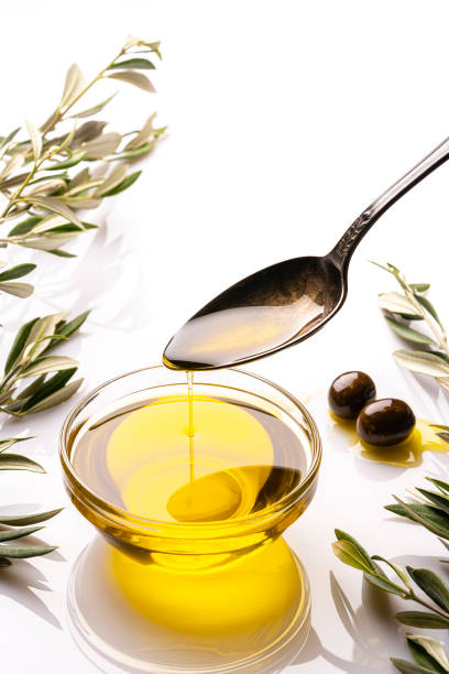 istock Pouring extra virgin olive oil 1270993700