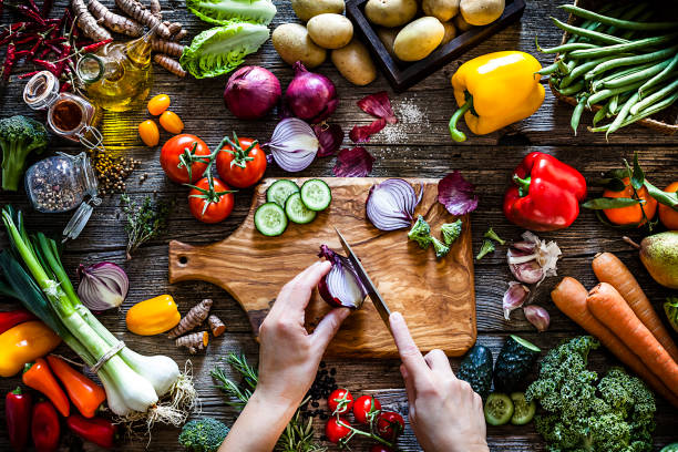 istock Cutting fresh vegetables for a healthy diet 1270993726