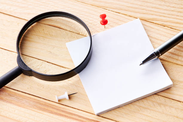 istock office workplace with blank sticky note. above view. wooden desk. background backdrop 1271000135