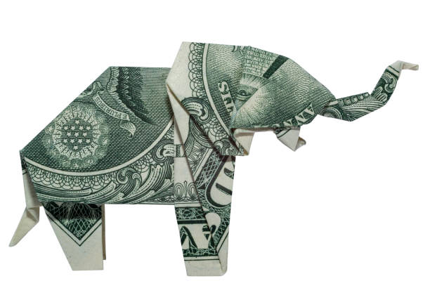 istock Money Origami ELEPHANT Right Side Folded with Real One Dollar Bill Isolated on White Background 1271002974