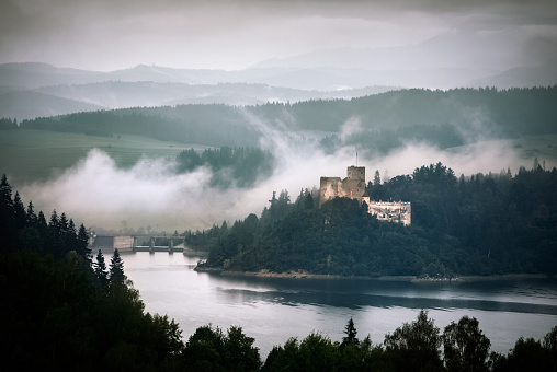 Niedzica, Poland - August 18,2020: The medieval Dunajec Castle in Niedzica on the Dunajec River. Photo taken from Czorsztyn.