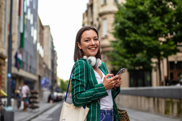 istock Modern woman on the street, coming back from work 1271005379