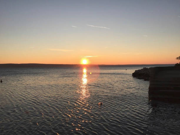 istock wonderful sunset on the beach 1271005481