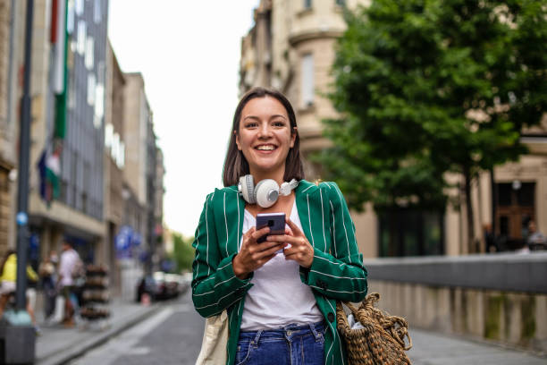 istock Modern woman on the street, coming back from work 1271005497