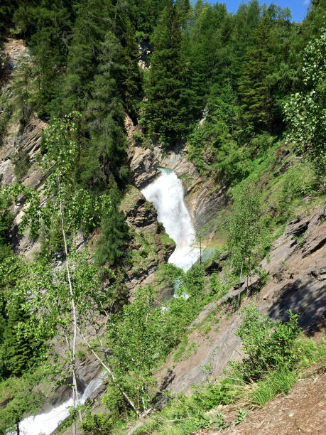 istock a wonderful waterfall in the forest 1271005598