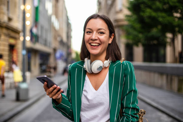 istock Modern woman on the street, coming back from work 1271005741