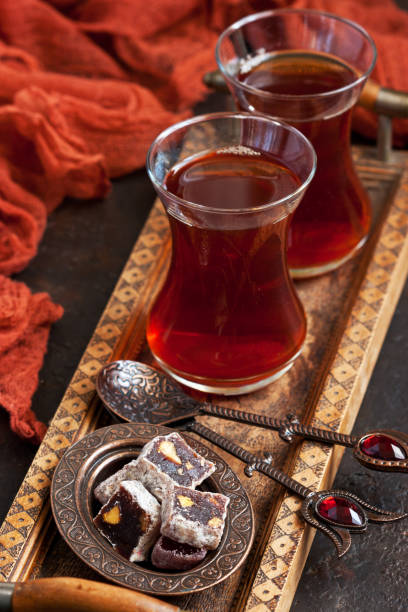 istock Turkish  tea with Turkish delight and traditional copper serving set 1271009333