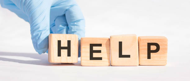 istock Wooden blocks with the word Help. Medical concept. 1271009624