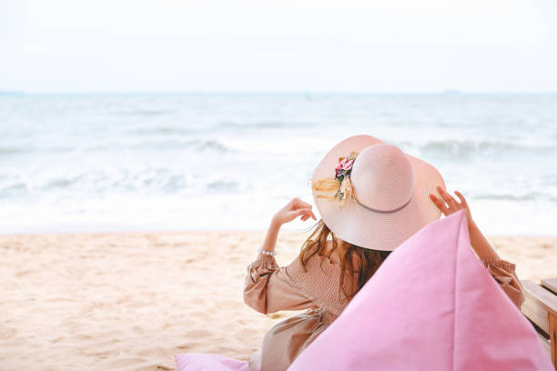 istock Woman on beach in summer 1271009653
