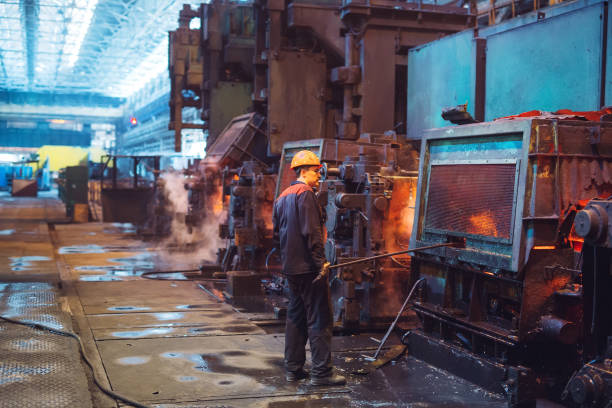 istock Workers in the steel mill. Metallurgical industry. 1271016082