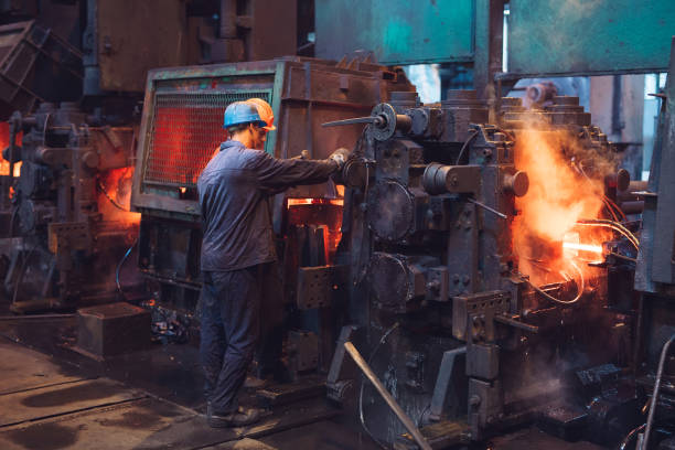 istock Workers in the steel mill. Metallurgical industry. 1271016607