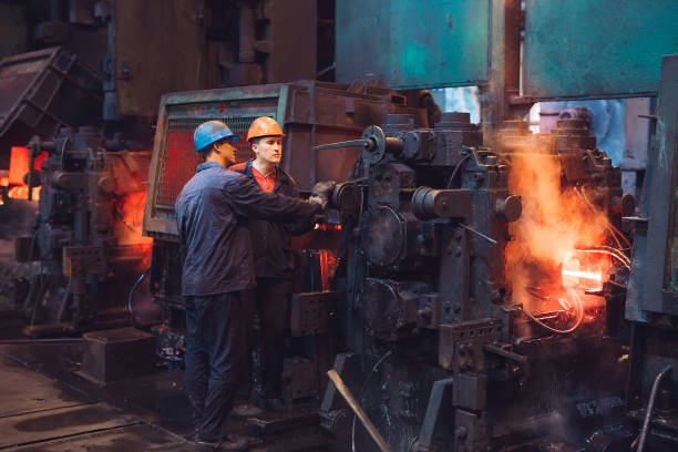 istock Workers in the steel mill. Metallurgical industry. 1271016613