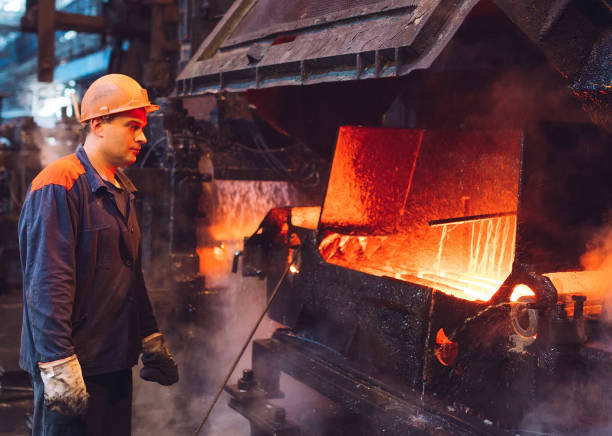istock Workers in the steel mill. Metallurgical industry. 1271016678