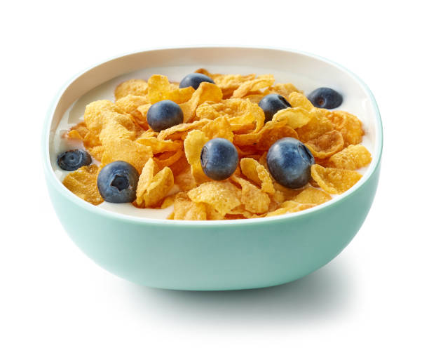 istock bowl of corn flakes with milk and blueberries isolated on white background 1271018992