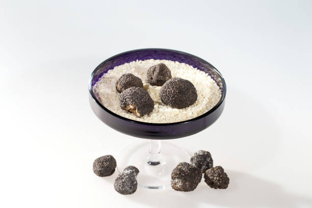 istock Black Truffles in rice on a white background. 1271019927