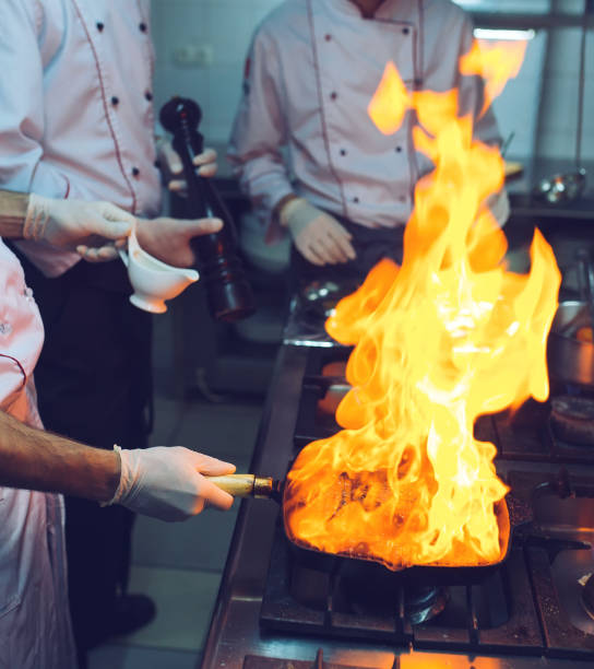 istock Fire in the kitchen. Fire gas burn is cooking on iron pan,stir fire very hot. 1271020722