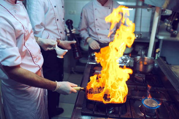 istock Fire in the kitchen. Fire gas burn is cooking on iron pan,stir fire very hot. 1271020730