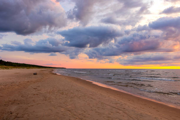 istock colorful sunset over the sea and beautiful cloudscape 1271021667