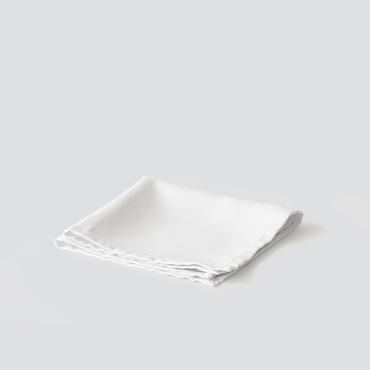 white napkin isolated on light grey background