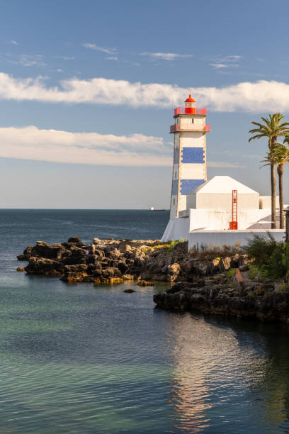 istock Beautiful view to ocean front lighthouse in Cascais 1271026608