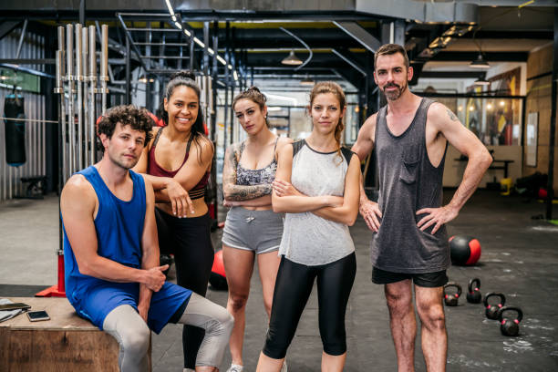 istock Relaxed gym friends taking a break from working out 1271030973