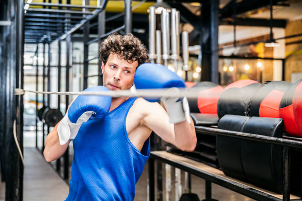 istock Hispanic male boxer practicing with slip rope 1271030979