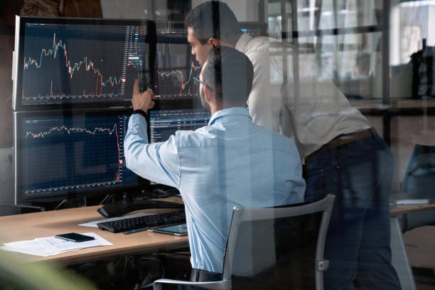 istock Two businessman checking global currency index on fund exchange 1271031331