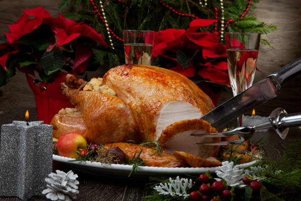 istock Carving Roasted Christmas Turkey with Grab Apples 1271035607