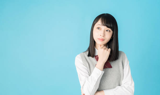 istock Thinking asian school girl. 1271040587