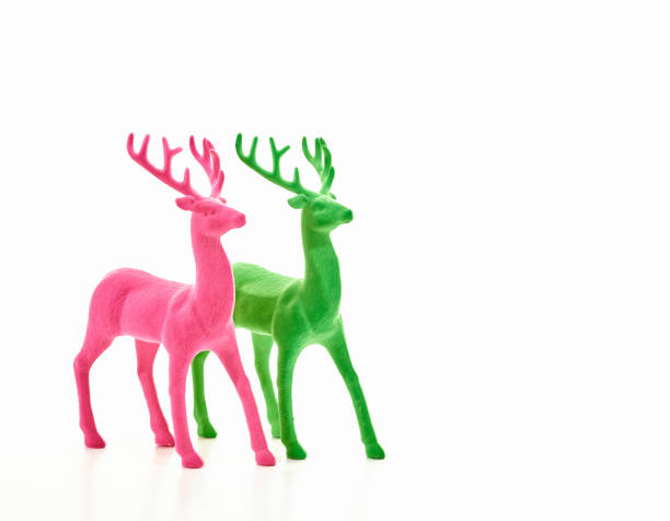 Christmas background with pink and green deer on white background