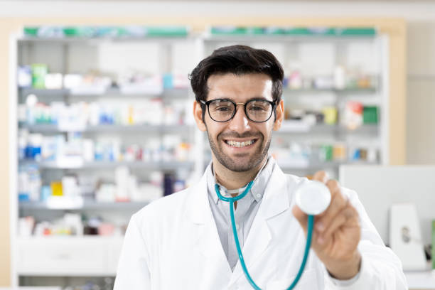 istock Portrait of Middle eastern male pharmacist standing with stethoscope 1271046152