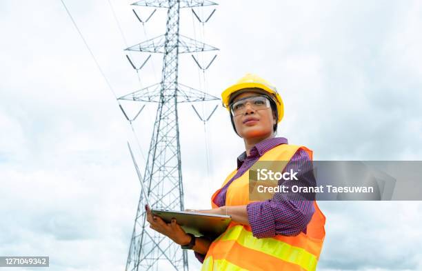 Electrical Engineer Women Use Laptop Working Stock Photo - Download Image Now - Women, Vitality, Fuel and Power Generation