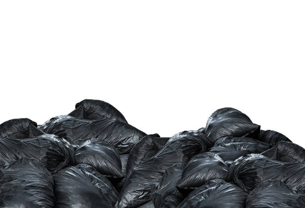 istock Pile of black garbage bags. Background with copy space 1271052507