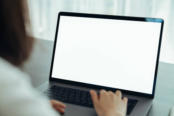 istock Woman had using laptop white screen and stationery on the table. 1271052611