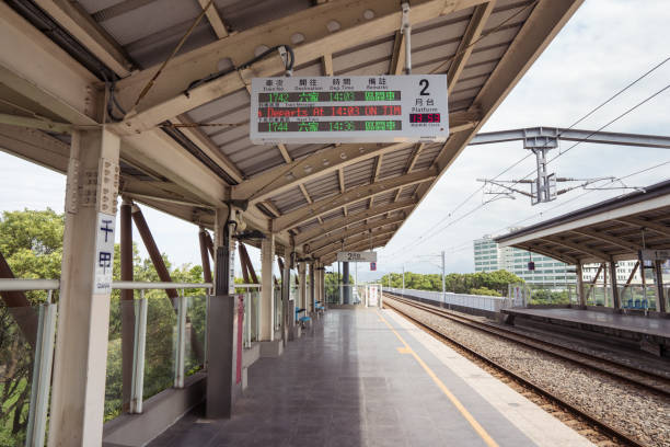 Hsinchu, Taiwan - April 11, 2020: Timeboard at Qianjia train station with no people on the platform, in Hsinchu, Taiwan