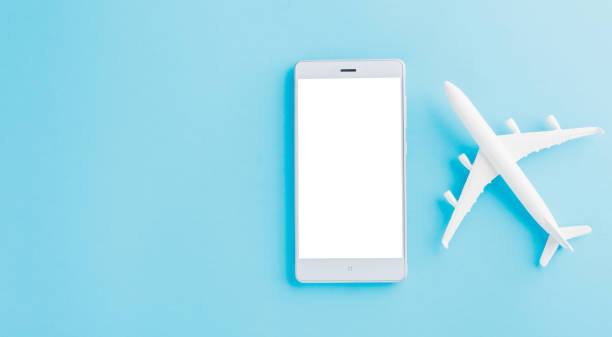 istock minimal toy model plane, airplane, and smartphone blank screen 1271065988