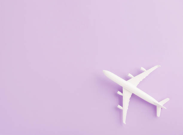 istock Top view flat lay of minimal toy model plane 1271065995