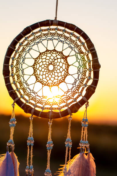 istock Handmade dream catcher with feathers threads and beads rope hanging 1271067248