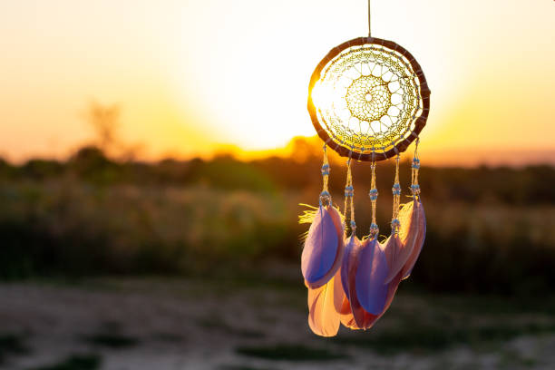 istock Handmade dream catcher with feathers threads and beads rope hanging 1271067251